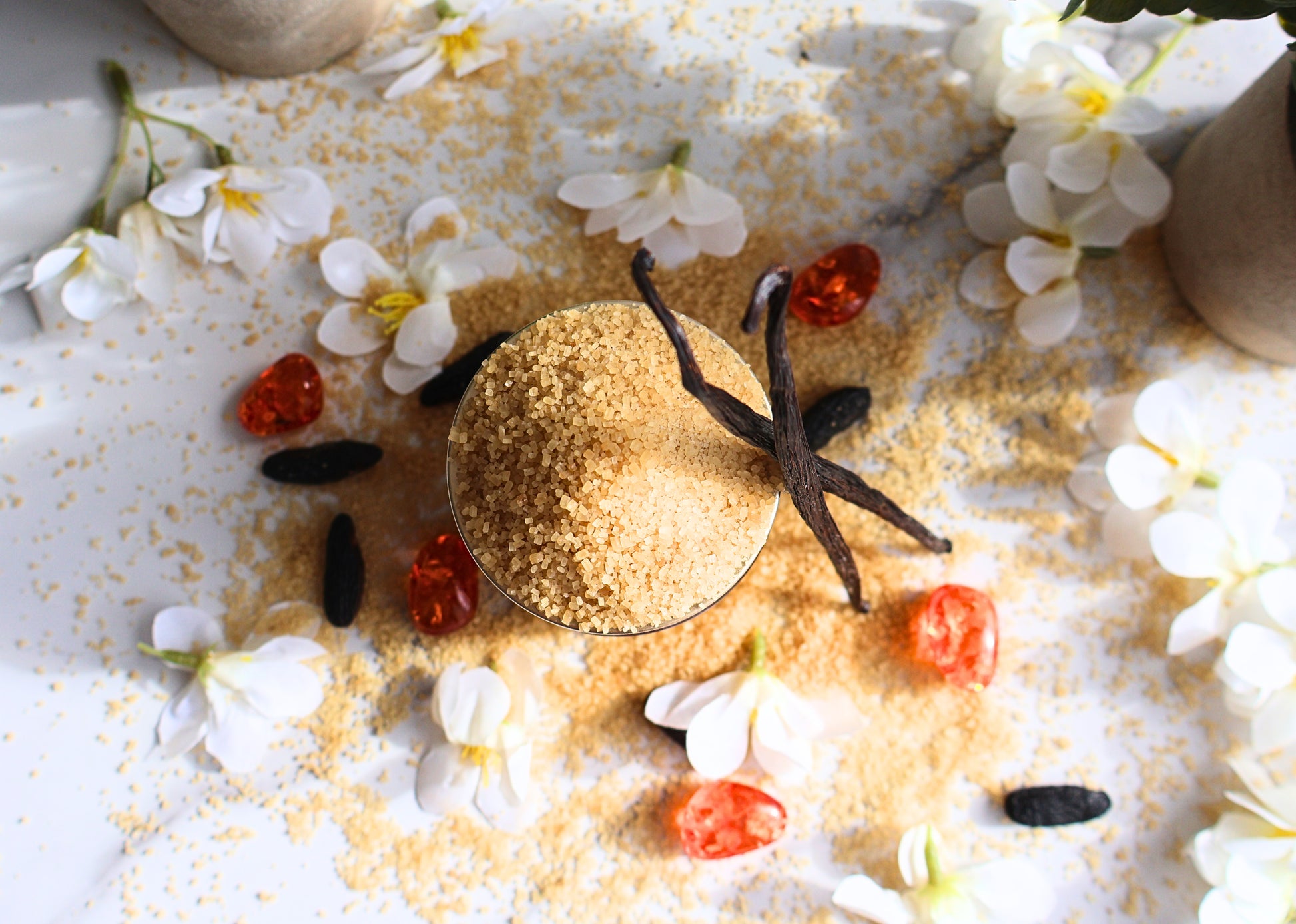 Luxury Vanilla Brown Sugar perfume body butter overhead view showing brown sugar vanilla beans and amber accents
